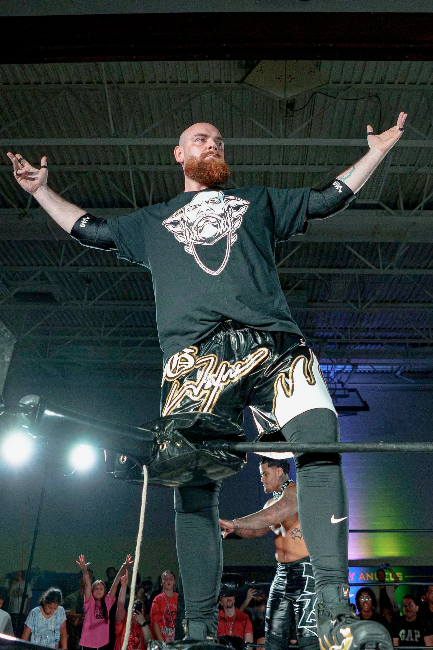 BG Wayne arms raised in ring